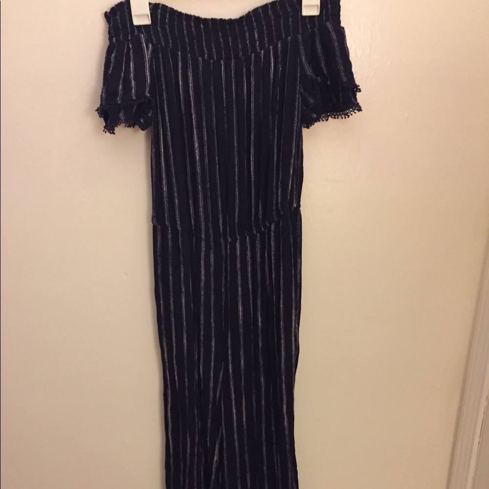 Mocked blue jumpsuit with white stripes